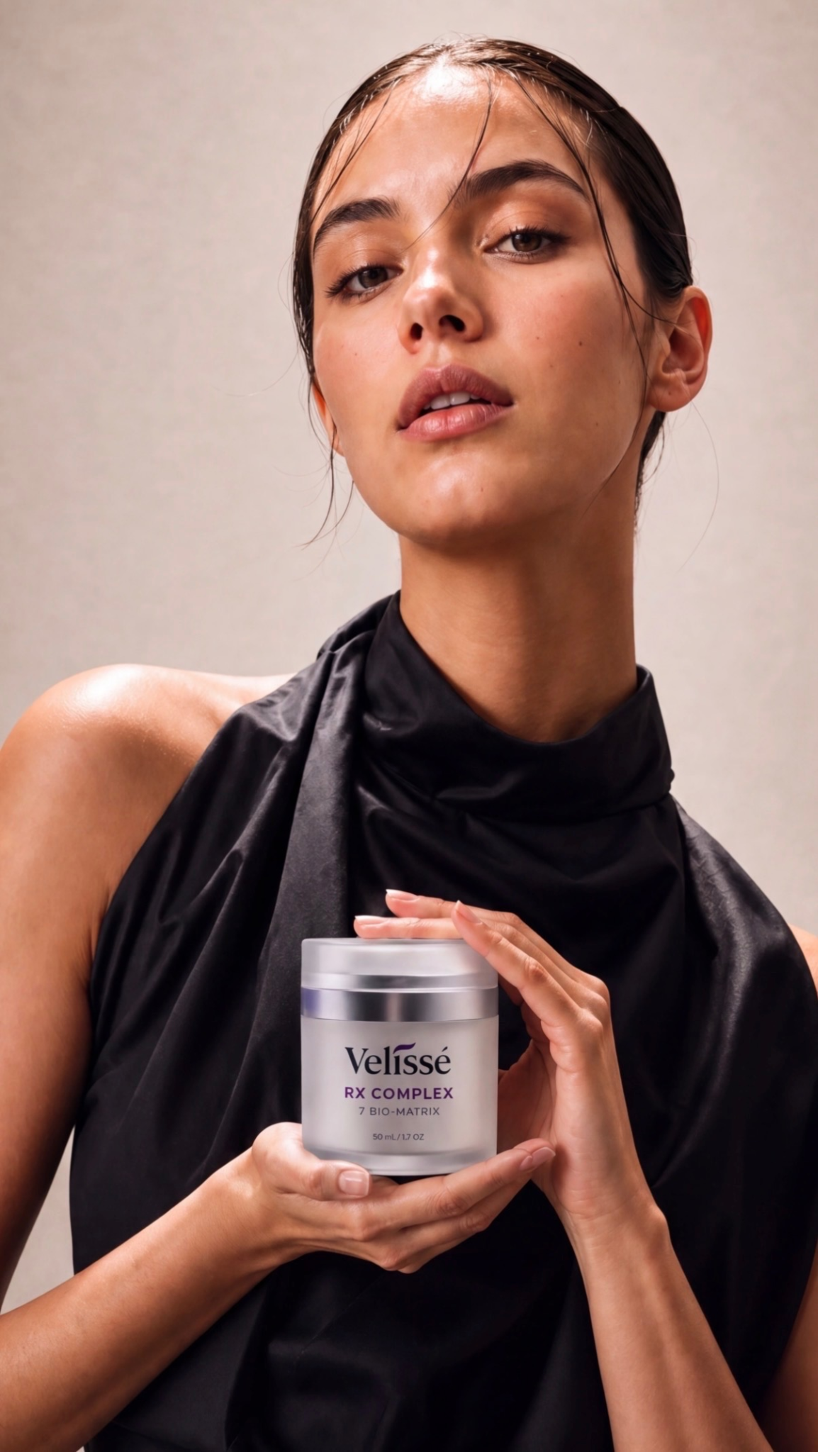 Model holding Velissé RX Complex jar